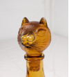 Brown glass decanter in the shape of a cat