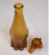 Brown glass decanter in the shape of a cat