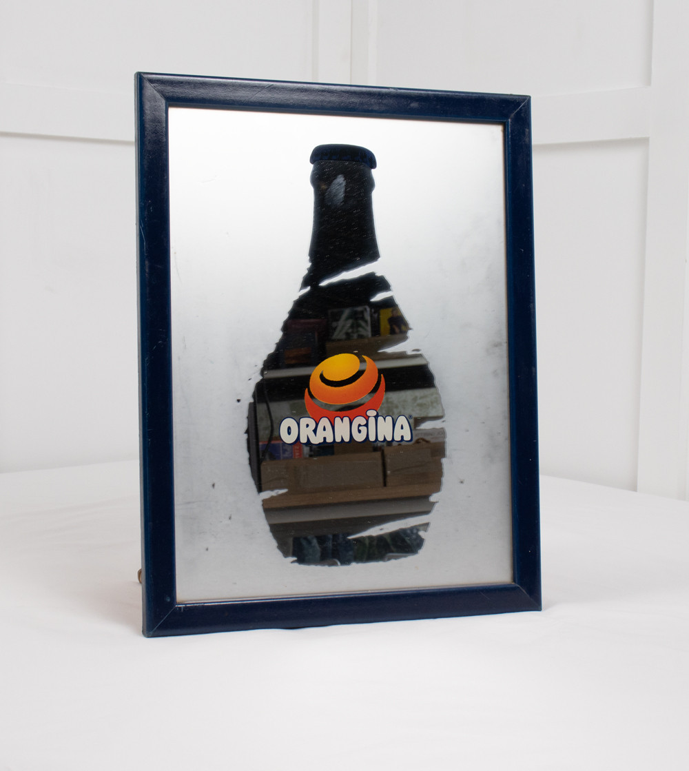 Espejo publicitario ORANGINA