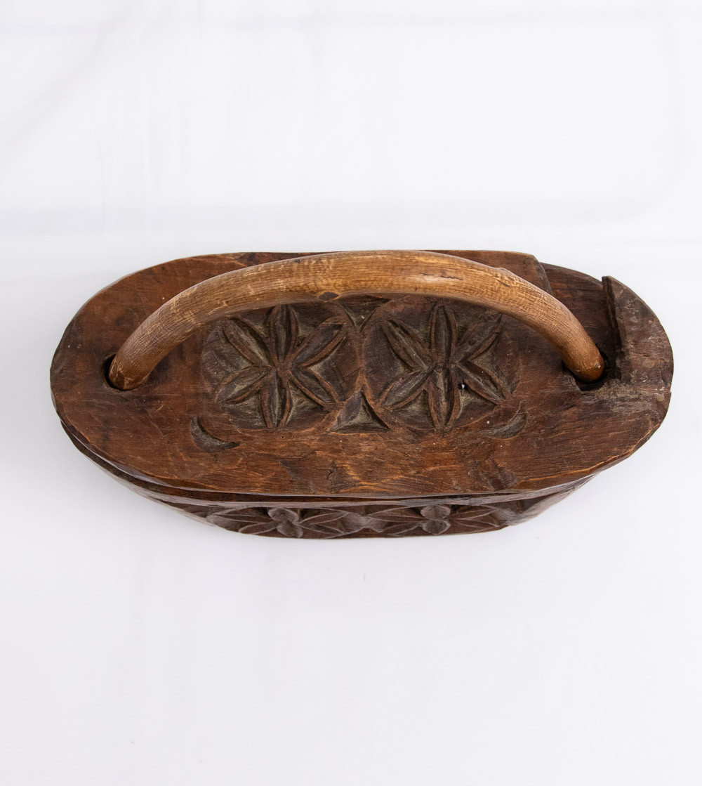 Wooden salt cellar carved with flowers